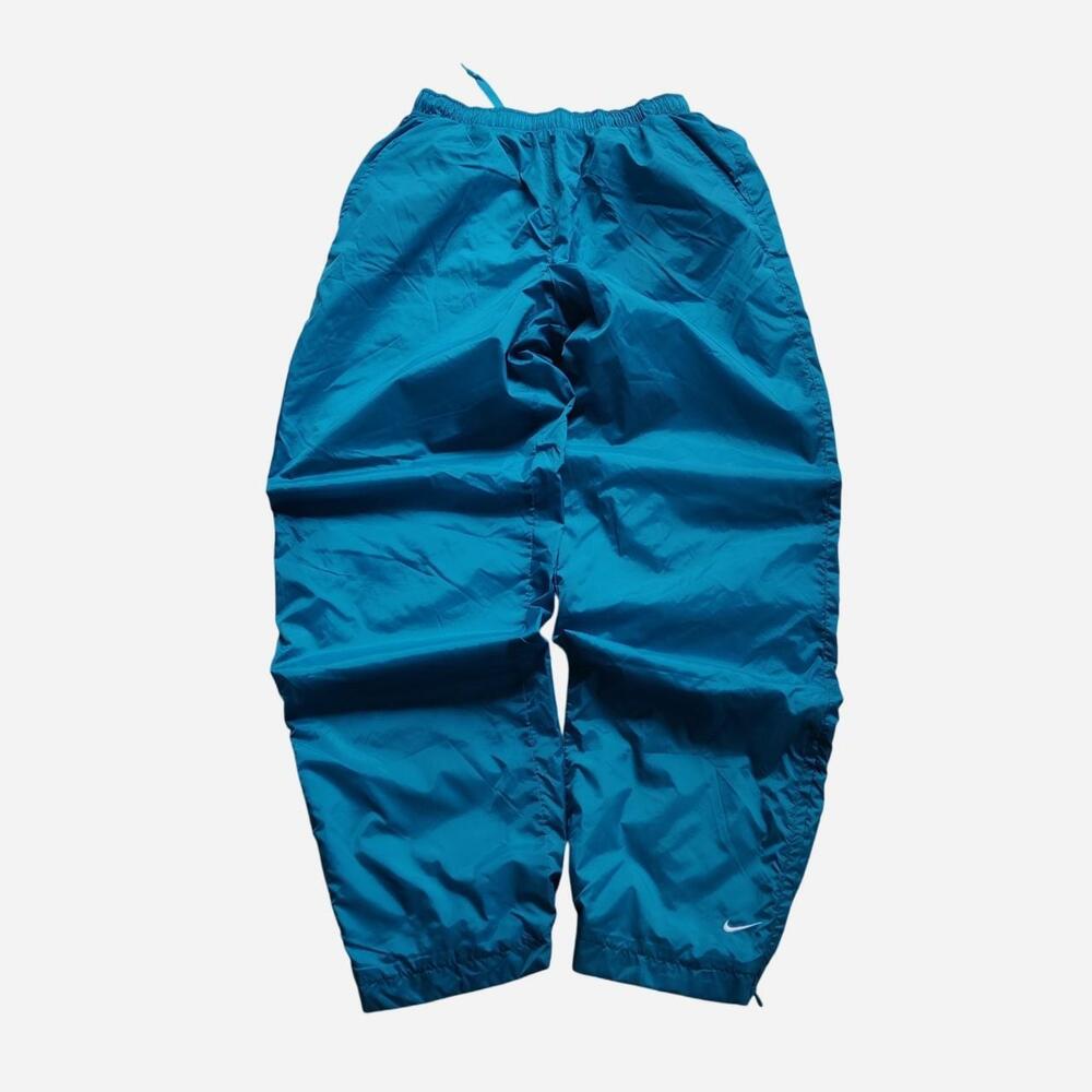 Vintage Nike Teal Trackpants with drawstring waist and elastic cuffs